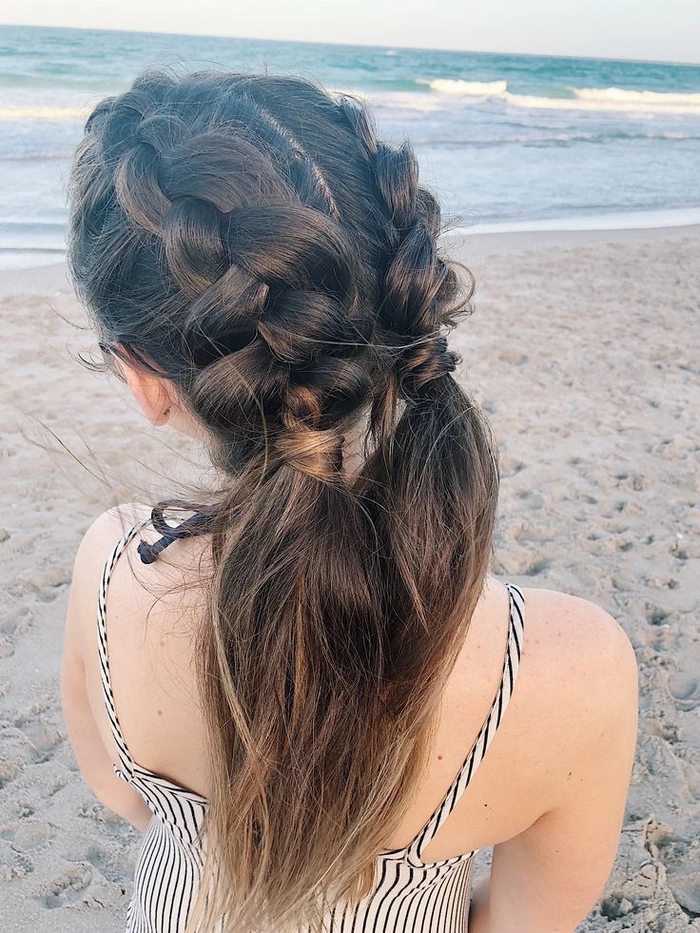 Effortless Beach Crown Braid Hairstyle A model showcasing an elegant beach crown braid with loose waves and subtle beachy texture