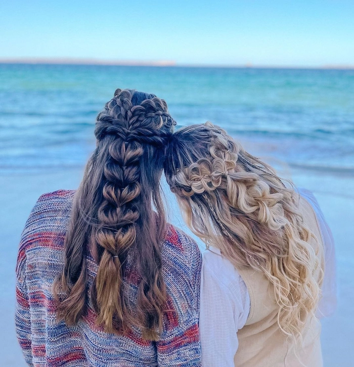 Elegant beach french braid with loose waves framing the face