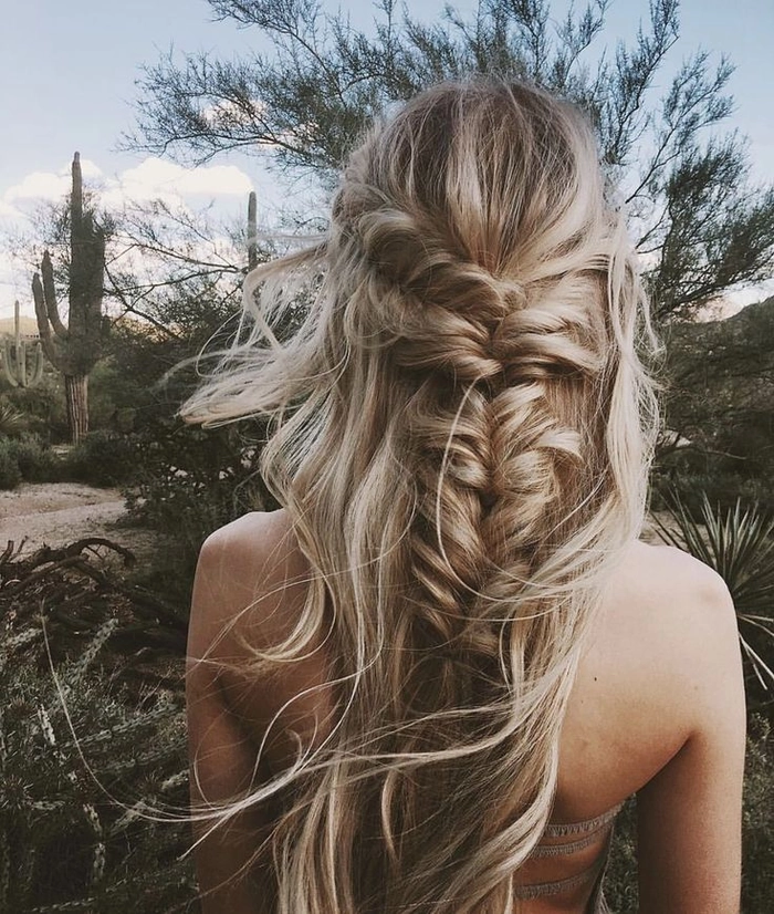 Beach hair with gold leaf accents - style four Beach hairstyle with loose waves and shimmering gold leaf accents