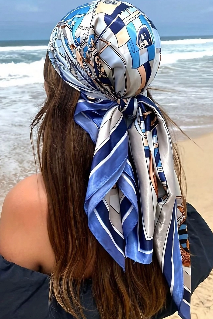 Beach hair styled for wearing a floppy sun hat with soft waves and natural texture