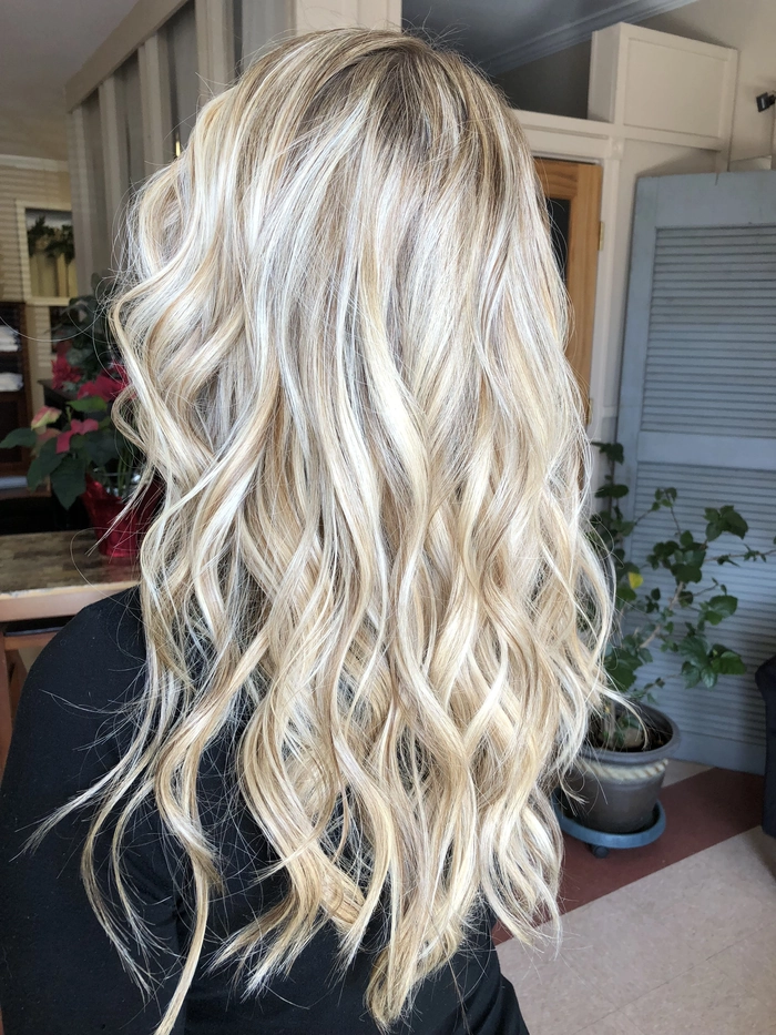 Platinum blonde beach waves with gentle tousled texture