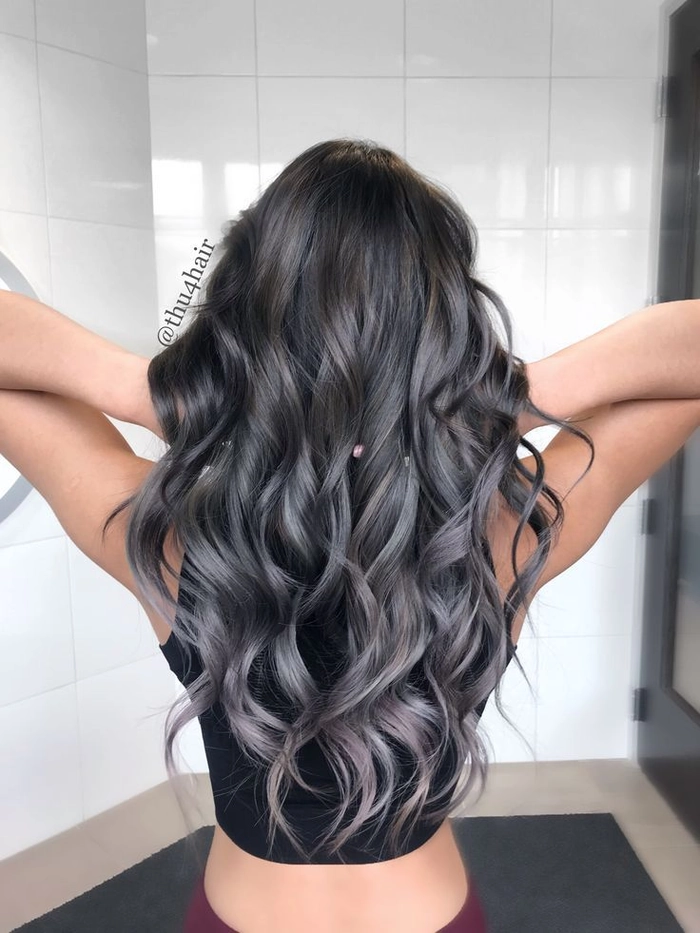 Elegant silver hair tousled by ocean breeze at the beach