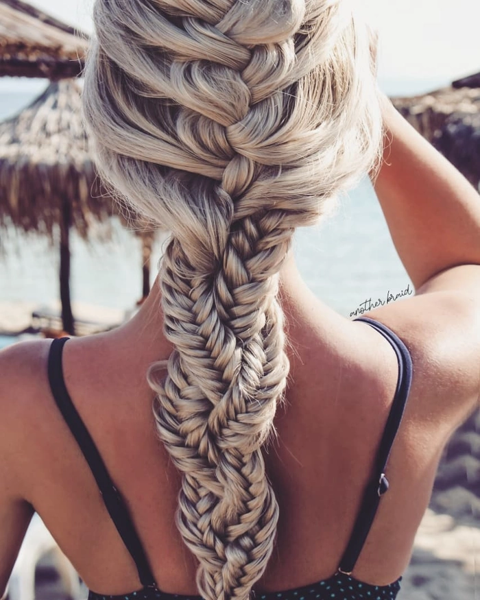 Beach side braid inspiration with soft waves and floral accents