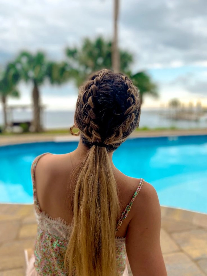 Beach side braid with soft waves and small white flowers