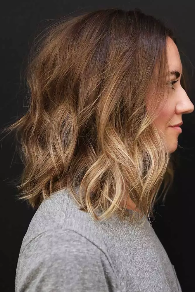 Medium length beachy waves with tousled texture for a casual summer look