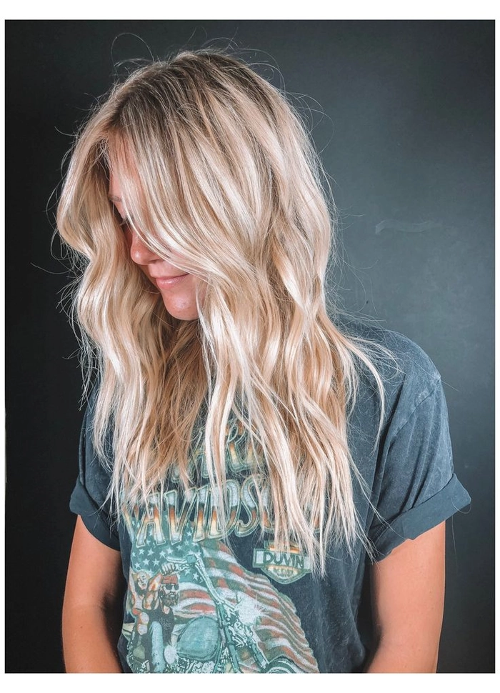Bleached blonde beach waves styled with a wide-tooth comb after a saltwater dip