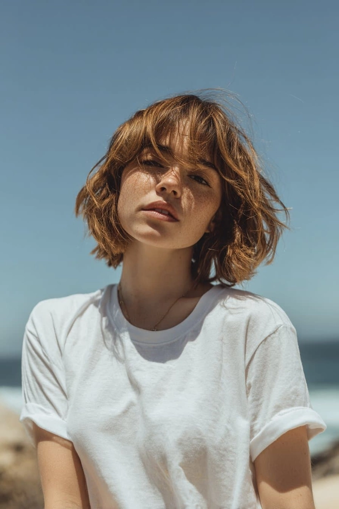 Wavy bob cut beach look with tousled texture