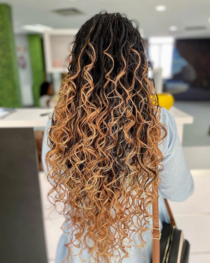 How to braid damp hair to achieve beach waves Woman braiding her damp hair for beach wave curls