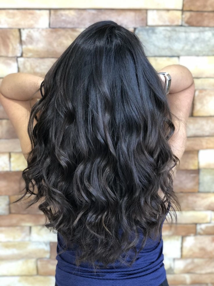 Brunette beach waves with dimension and soft texture