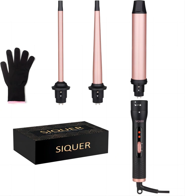 Adjusting the temperature dial on a curling wand to create loose beach waves