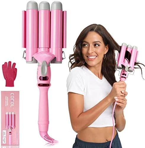 Woman with loose beach waves created using medium heat setting on a curling wand