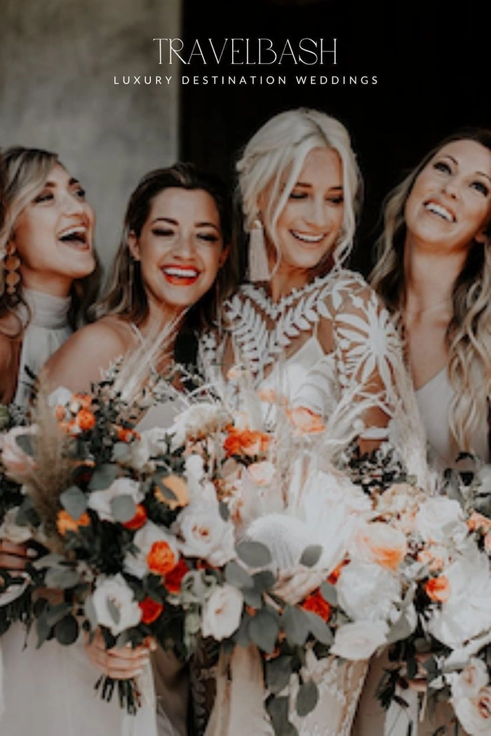 Beach wedding hairstyle for a destination bride with soft curls and accessories Destination wedding beach hairstyle with loose waves and tropical flowers