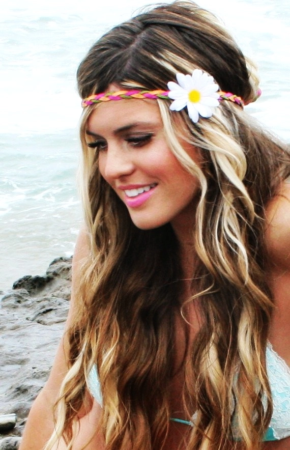 Edgy beach hair with braided sections and metallic hair rings