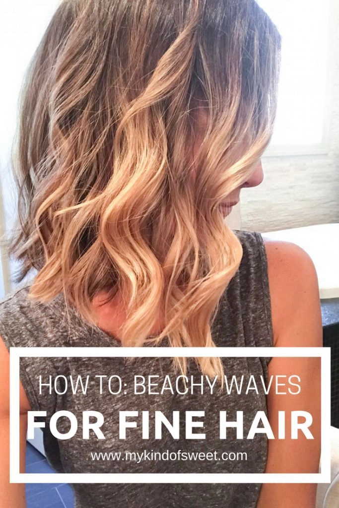 Woman with fine hair flipping beach waves for volume with sea salt spray