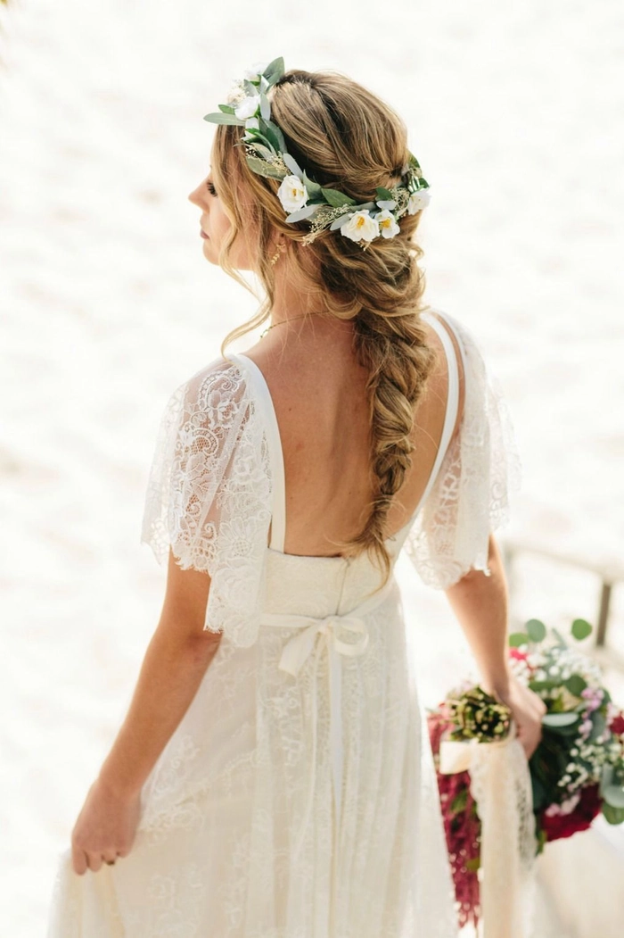 Model with loose beach waves and a fresh floral crown