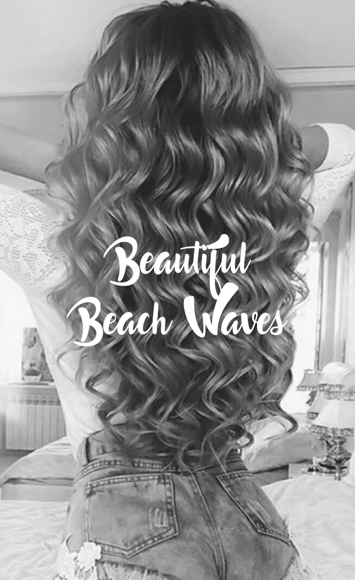 Effortless glamorous beach wave hairstyle with soft curls and sun-kissed highlights