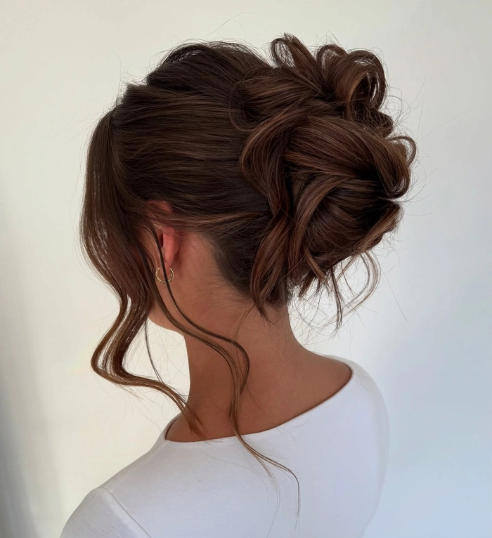 Twisted Beach Updo Concept for Effortless Summer Style Creative beach hairstyle idea showcasing a twisted updo with braids and loose waves