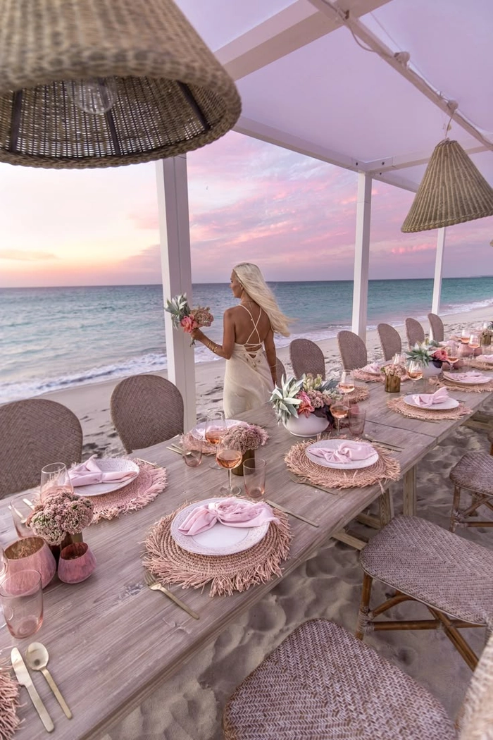 Elegant beach hairstyle at sunset dinner by the shore