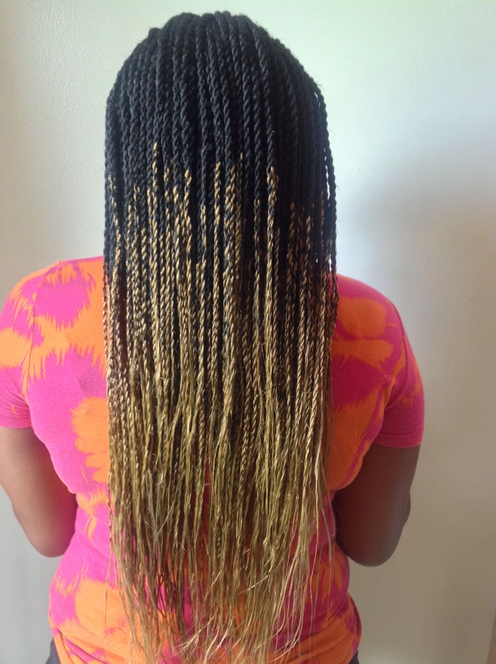 Ombré beach braid with sun-kissed highlights flowing into a textured fishtail