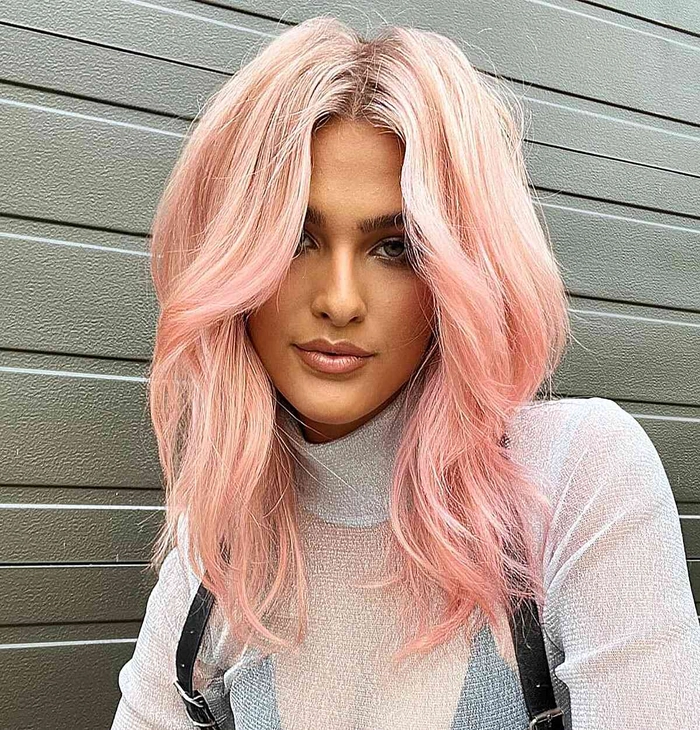 Soft pastel hair color beach styling with windswept waves