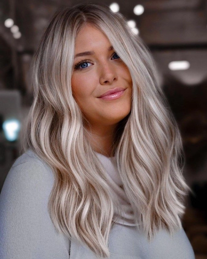 Platinum blonde beach waves with sea salt texture