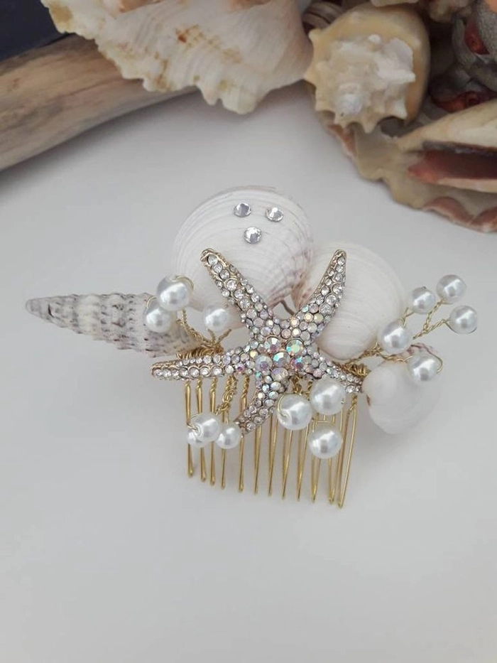 Seaside bridal hairstyle adorned with delicate seashell hairpins and pearls