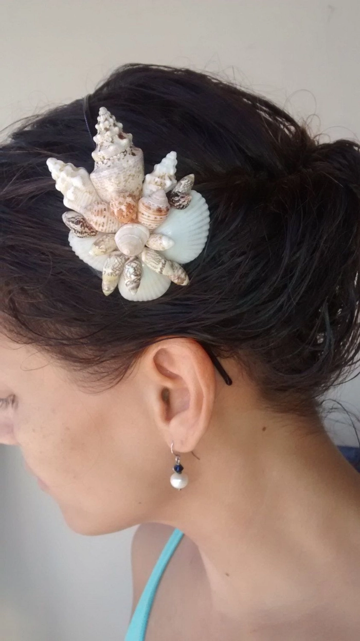 Bride with seashell hair accessories at a beach wedding hairstyle