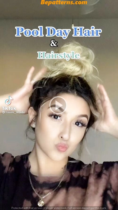 Woman transitioning her hair from swimming pool to beach with natural waves and sun-kissed highlights