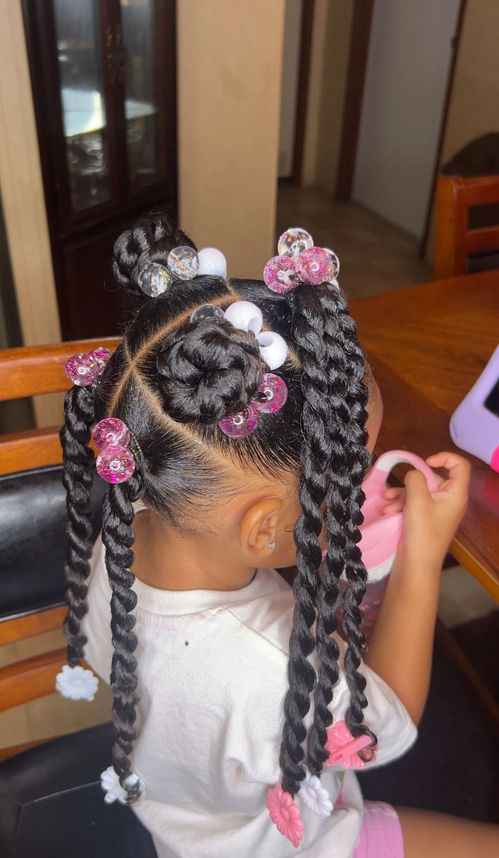 Creative beach hair ideas for toddlers fun and sun Adorable toddler with cute beach hairstyle playing in the sand