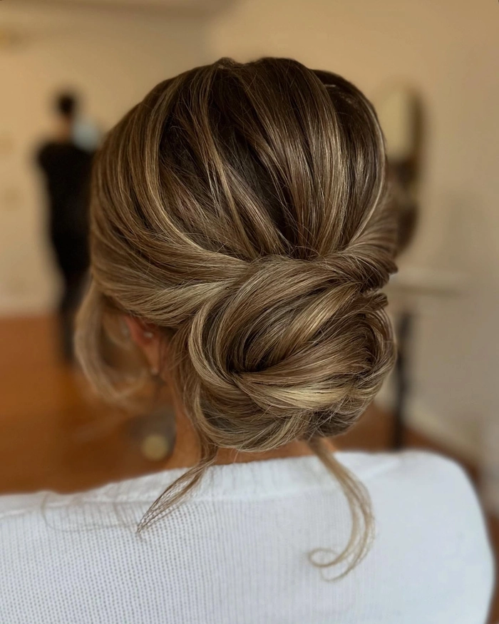 Eighth twisted beach updo concept featuring intricate twists and sun-kissed texture Twisted beach updo with braided accents and soft waves for a casual seaside style