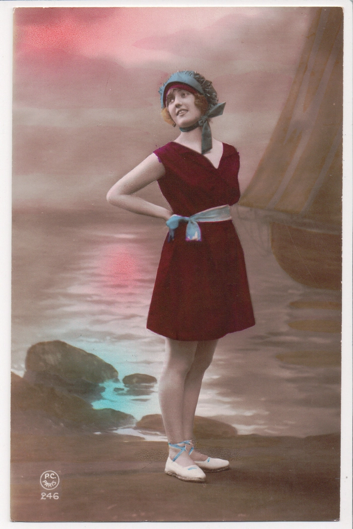 Vintage pinup beach hairstyle with soft waves and a retro headscarf