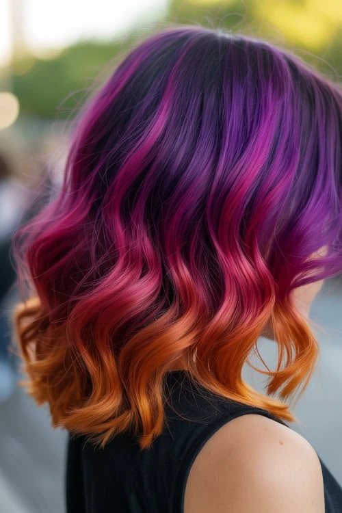 Vividly colored beach hair styled with care and ocean breeze
