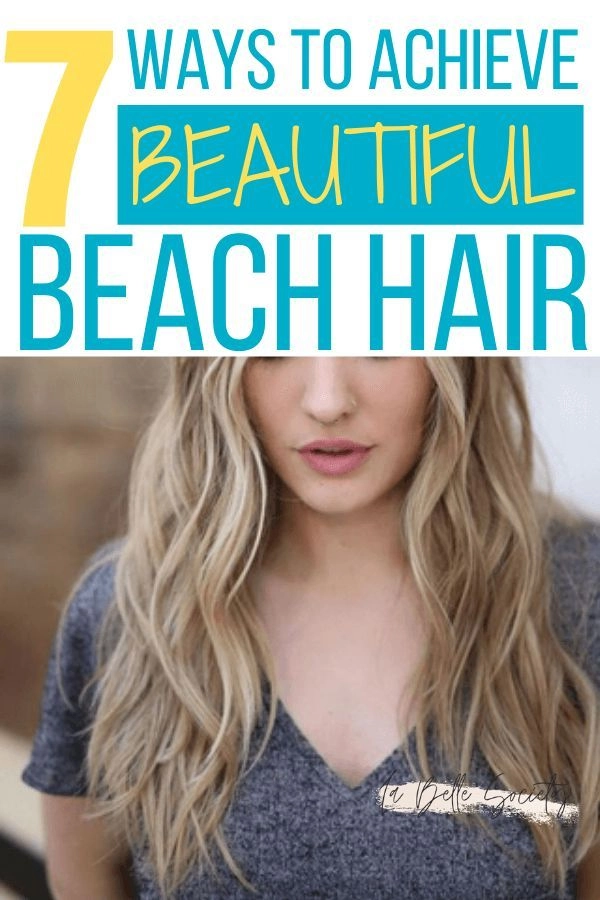 Perfecting beach hairstyles with a wavy hair enhancement routine Woman with tousled beach waves applying sea salt spray for wavy hair enhancement