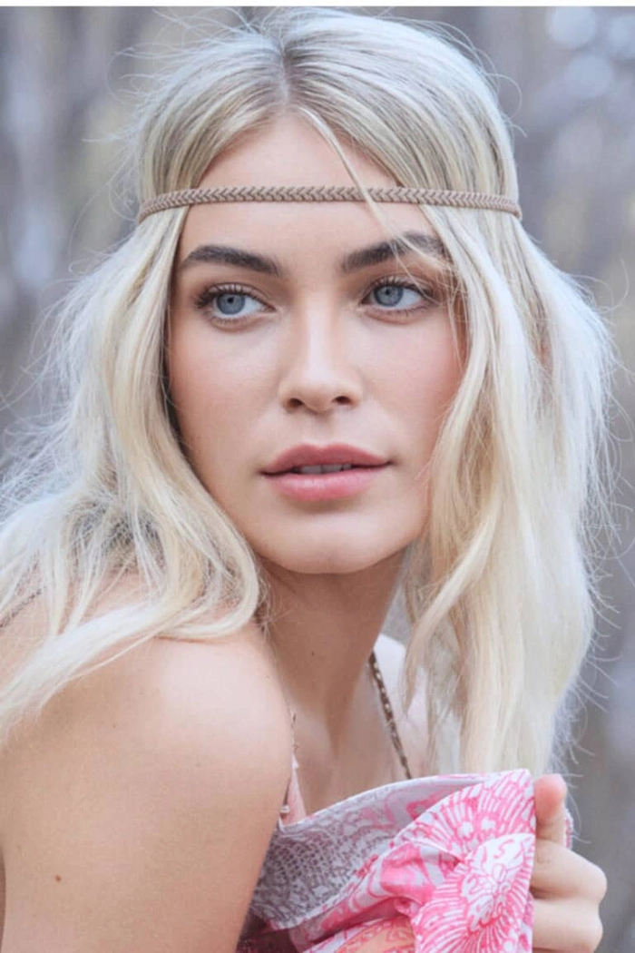 Beachy waves styled with colorful woven headbands for a summer look Relaxed beach hairstyle featuring woven headbands on sun-kissed hair