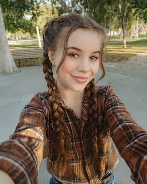 Casual and easy Dutch braid hairstyle for busy teens on the go Active teen with a quick Dutch braid hairstyle perfect for casual days