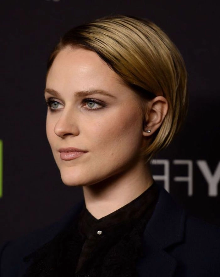 Simple tucked behind ears styling showcasing a blunt bob haircut with a casual, effortless look