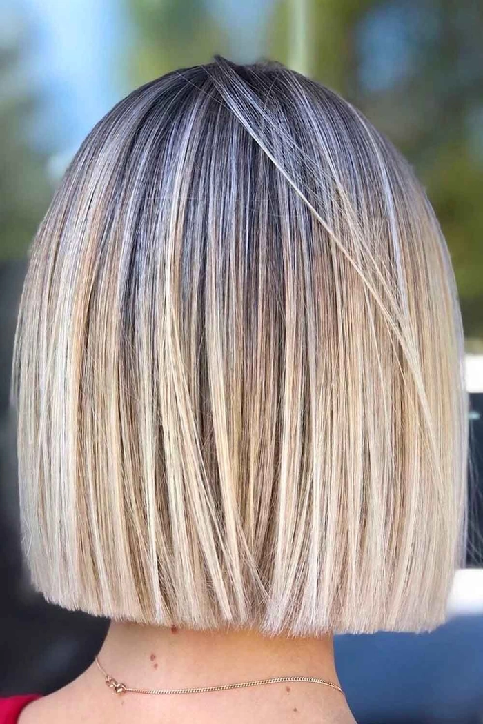 Casual hairstyle featuring a modern blunt cut bob on straight hair page 14 Everyday blunt cut bob styling for straight hair with sleek finish