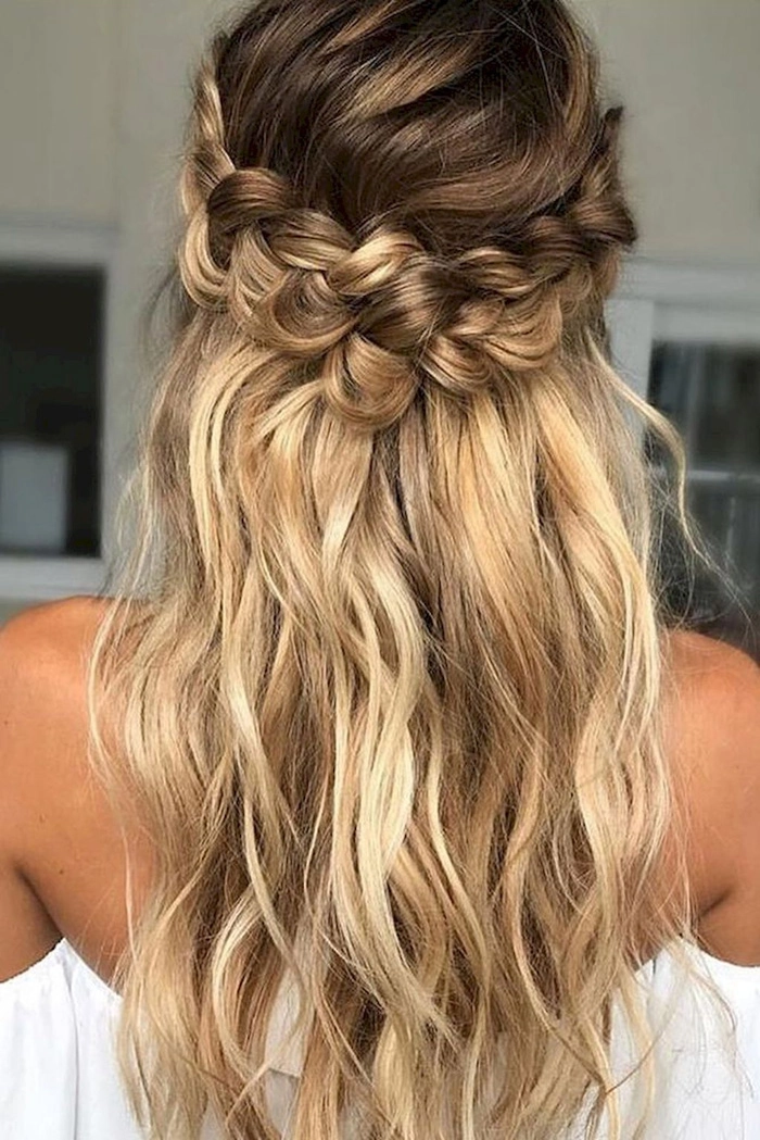 Bohemian casual hairstyle featuring a simple crown braid with loose waves