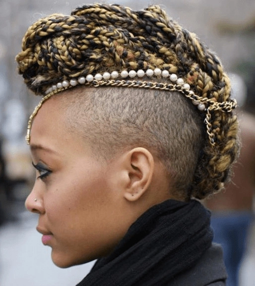 Braided mohawk with textured braids and subtle volume perfect for everyday casual street style Casual braided mohawk hairstyle with shaved sides and loose braids for an edgy streetwear look