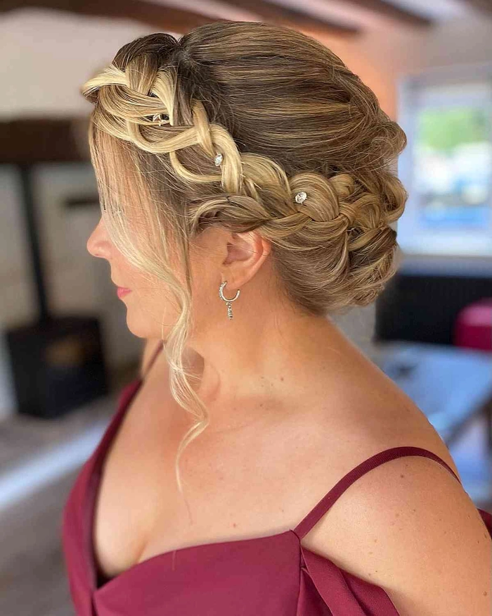 Casual halo braid hairstyle perfect for summer vacations with loose waves