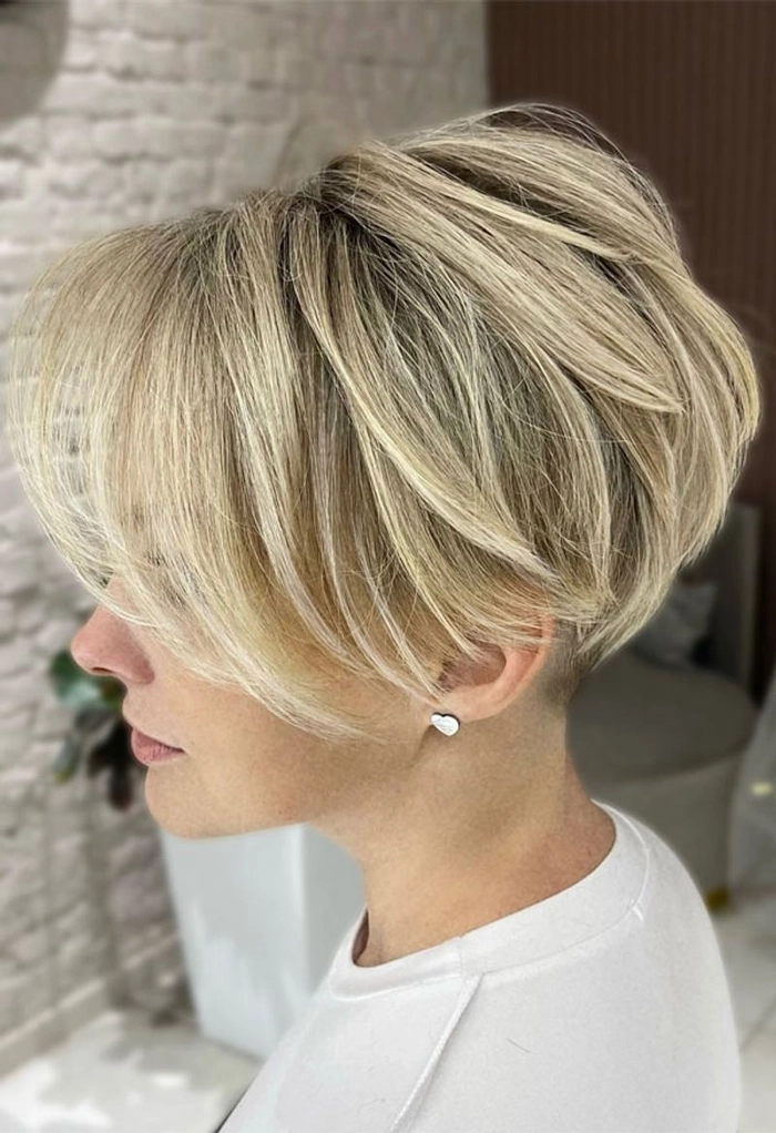 woman with fine thin hair wearing a casual inverted bob hairstyle, back view, soft tousled look