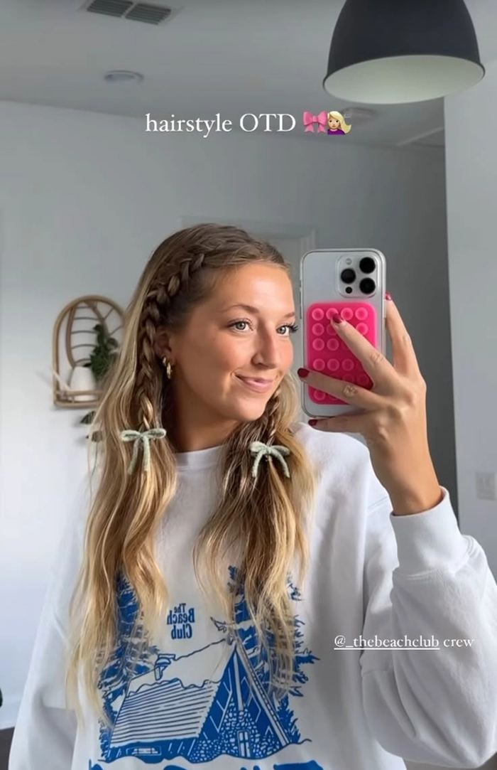 Casual preppy hairstyle with a simple barrette securing loose waves