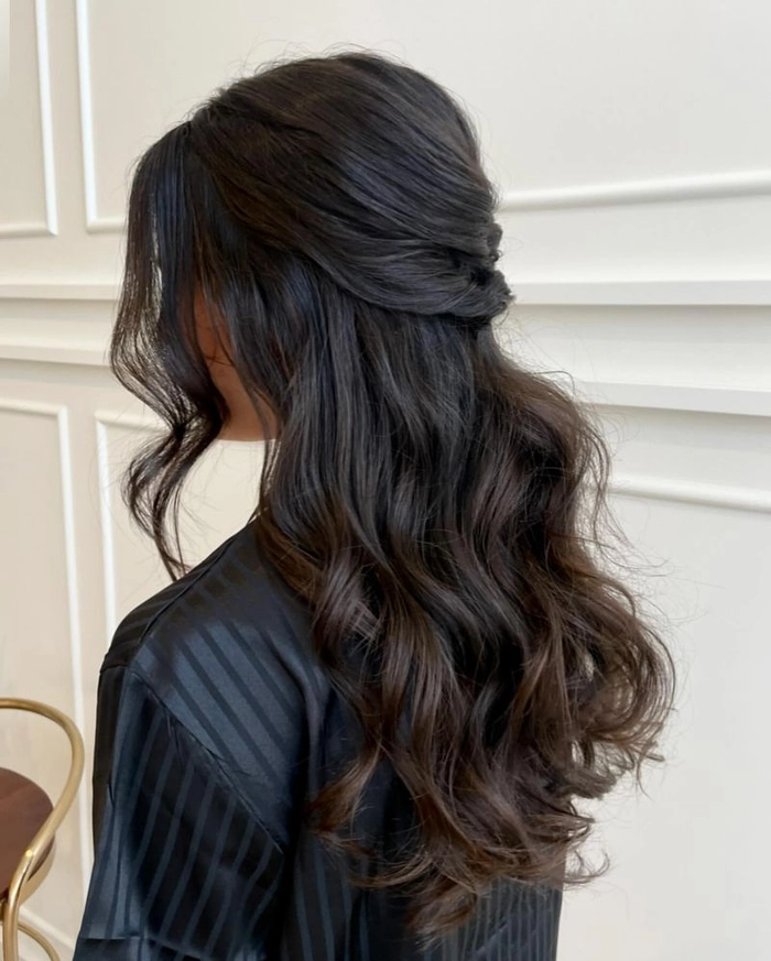 Casual twisted half up hairstyle on thin hair with soft waves