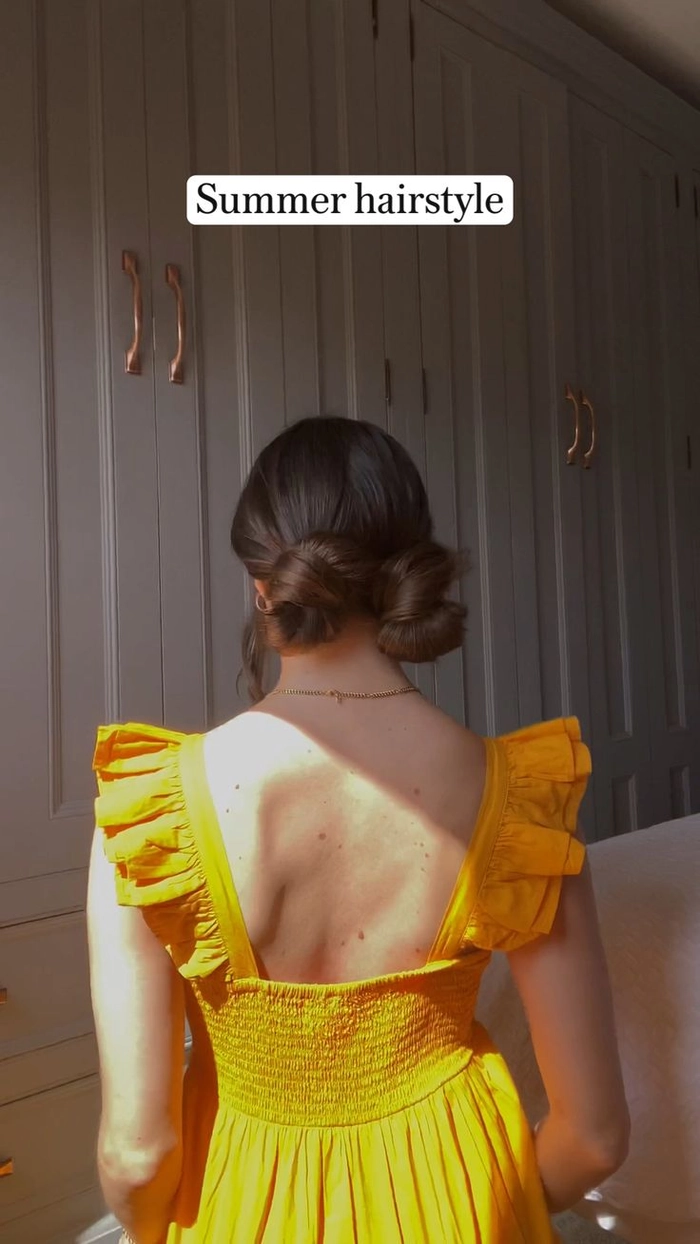 two casual twisted pigtail buns ideal for playful weekend styling