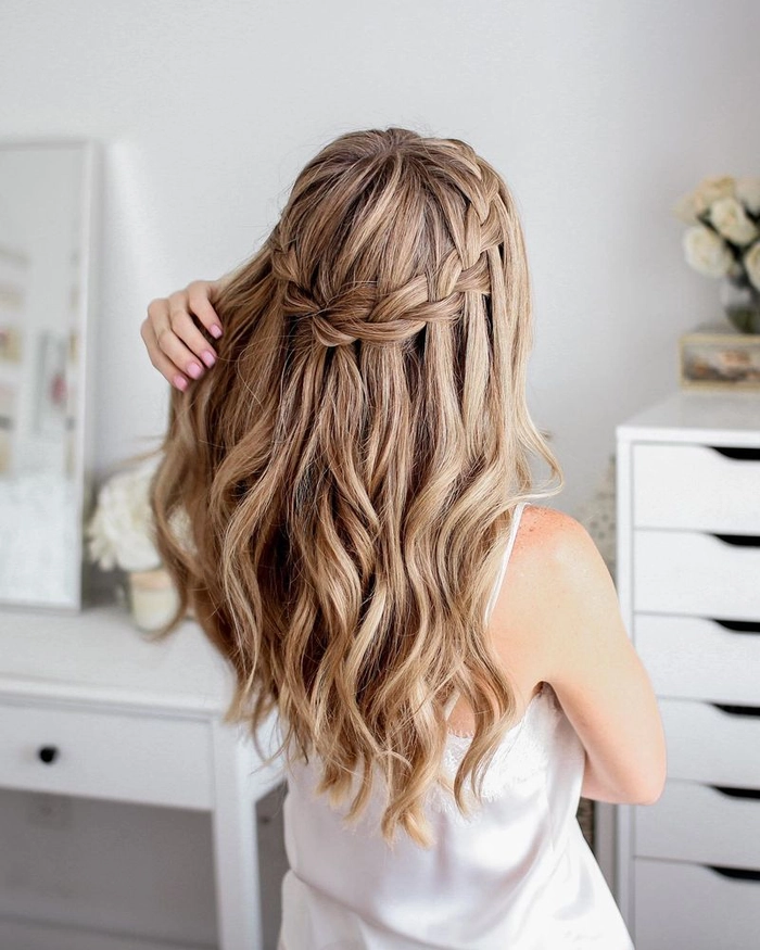 Elegant casual waterfall braid style perfect for date night inspiration Casual waterfall braid hairstyle styled for a romantic date night look