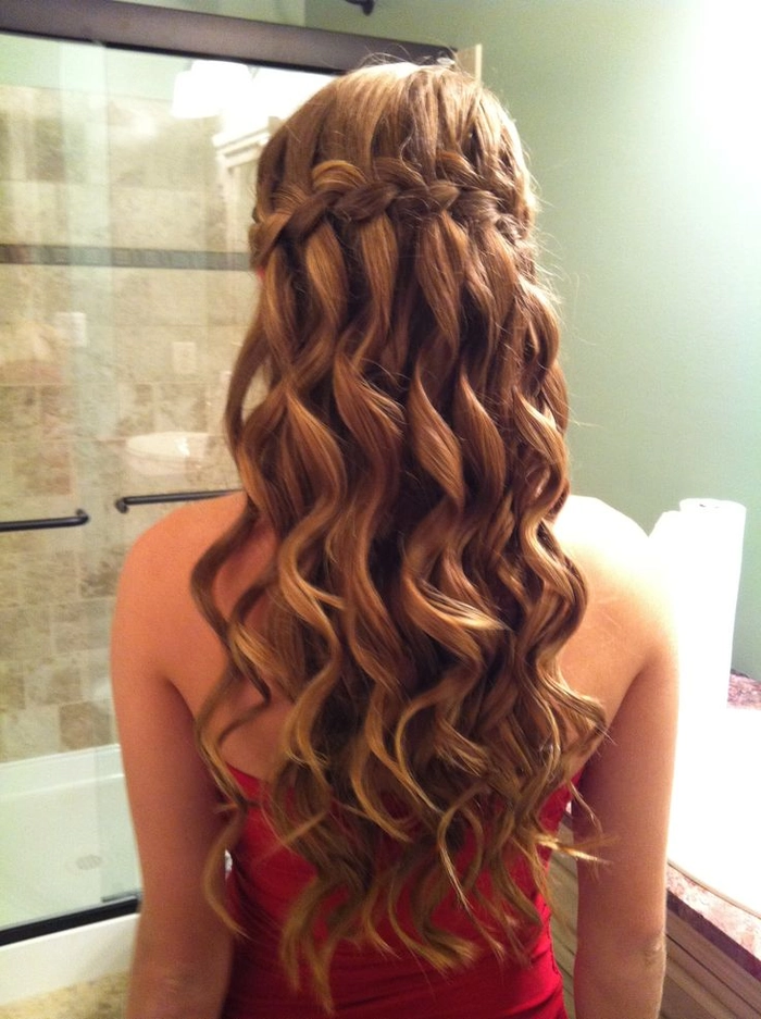 Elegant casual waterfall braid style idea for a romantic evening out Casual waterfall braid hairstyle featuring loose curls perfect for date nights