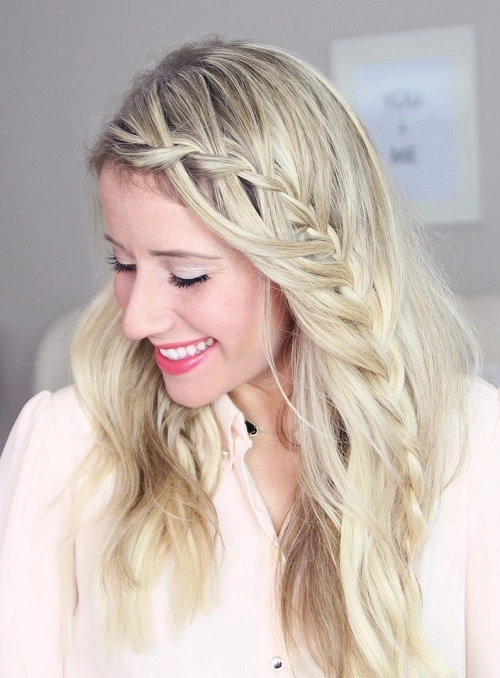 Elegant casual waterfall braid hairstyle perfect for romantic evening outings Casual waterfall braid style showcasing loose waves ideal for date nights