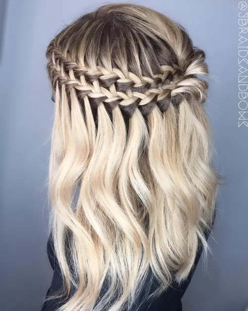 Effortless casual waterfall braid style for a charming date night look casual waterfall braid styled hair perfect for romantic date nights