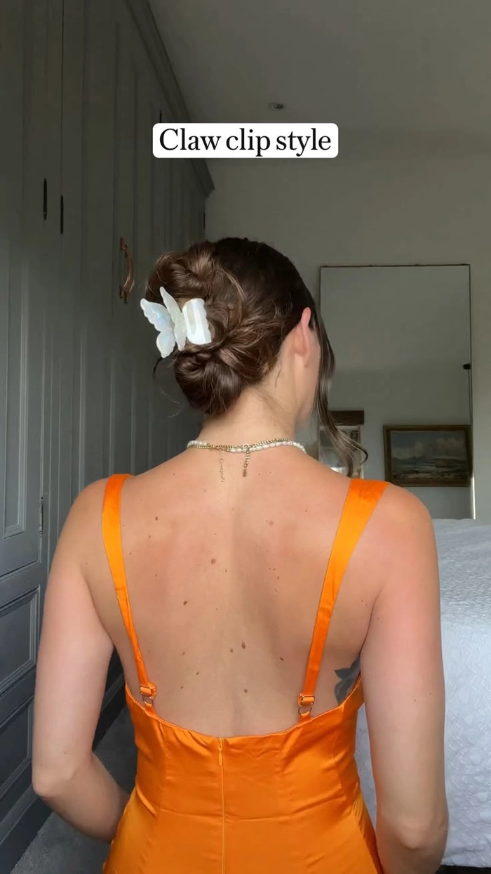 Effortless casual twists with a claw clip for shoulder length hair style number 15 Simple claw clip hairstyle showcasing easy twists for shoulder length hair