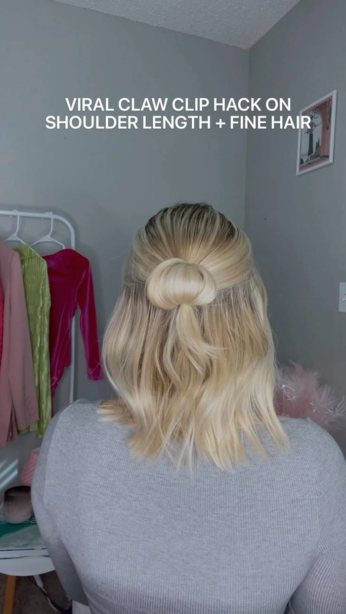 Casual shoulder length hair styled with a simple claw clip twist technique Simple claw clip twist hairstyle on shoulder length hair for a casual look